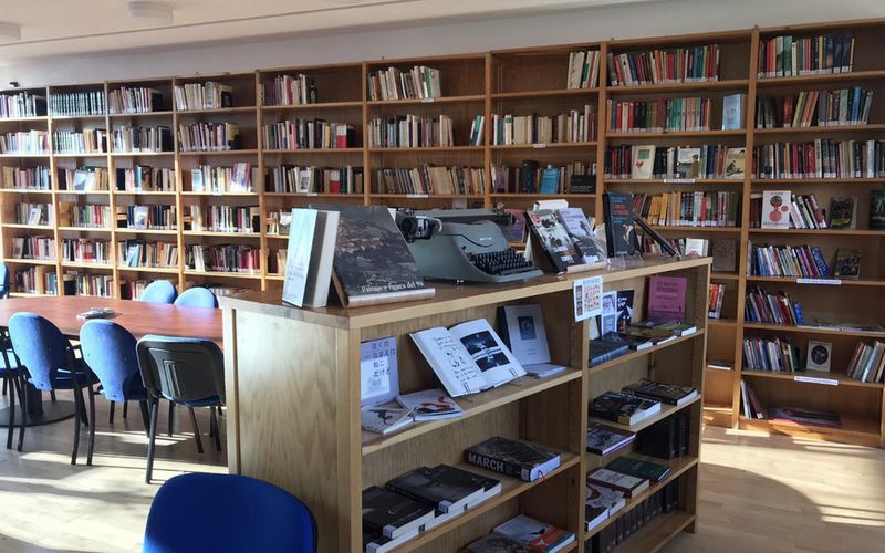 School library with bookshelves and reading tables in Madrid